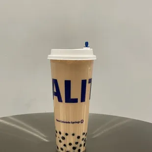 a coffee cup on a table