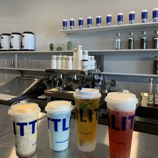 a variety of beverages on a counter