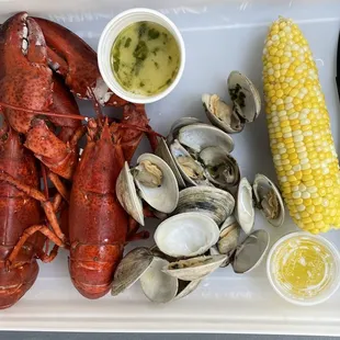 Twin lobsters, little necks, corn