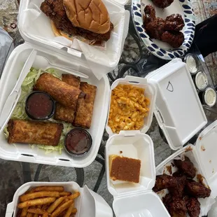 Nashville chicken sandwich, brisket egg rolls, Mac n cheese, bbq wings, Detroiter sub, cornbread