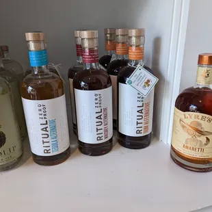 a variety of bottles of liquor