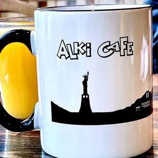 a mug with a lighthouse on it