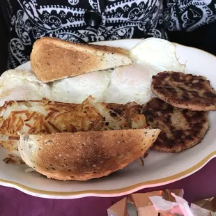 Eggs, sausage, toast and hash browns