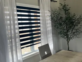 Designer Blinds & Shutters