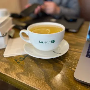 a cup of tea and a laptop