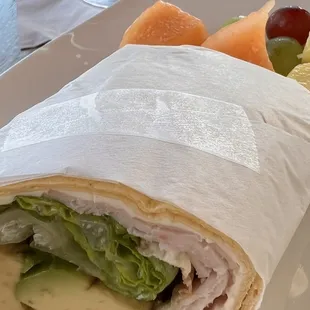 Turkey Bacon Avocado Wrap with fruit