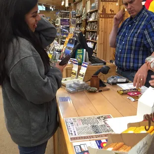 Happily making a purchase.