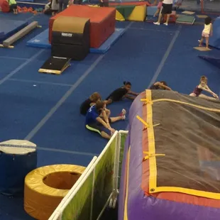 Kids stretching before their gymnastics practice!
