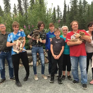 8 of us at the musher's camp. We all got to hold a puppy.