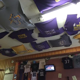 The decor -- T-shirts on the ceiling and jerseys on the wall.