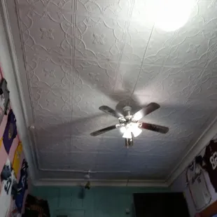 a ceiling fan in a kitchen