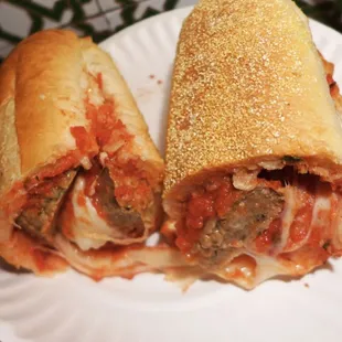 a hand holding a paper plate