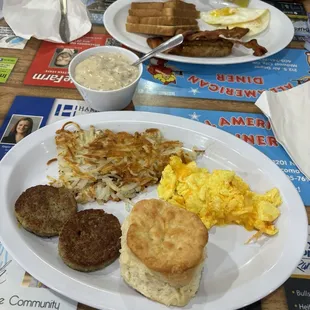 2 eggs breakfast with sausage patties, hashbrowns, biscuit and gravy.