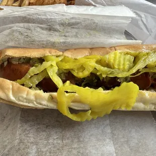 Sausage dog with banana peppers