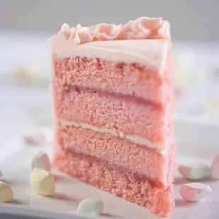 a slice of pink cake