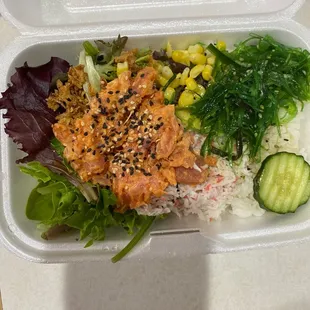 a meal in a styrofoam container