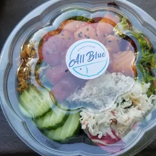 a salad in a plastic container