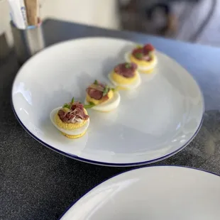 a plate of deviled eggs