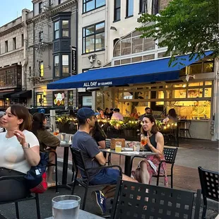 a group of people eating outside