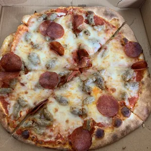 Pepperoni and sausage pizza