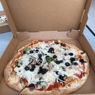 Cheese Pizza with Olives, Spinach, Onions, Mushroom, and Parmesan