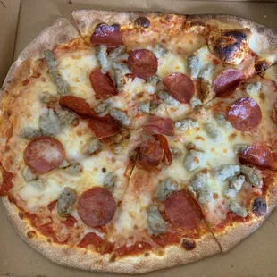 Pepperoni and sausage pizza
