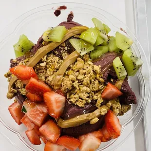 a bowl of fruit and granola