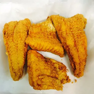 a basket of fried fish