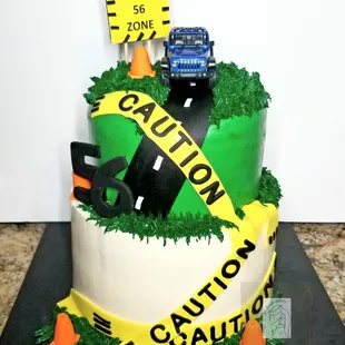 a cake with a caution tape around it