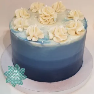 a blue and white cake