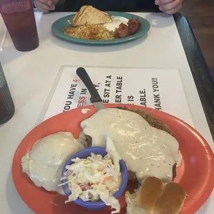 Country fried steak with mash and slaw