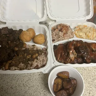 Oxtails plate and jerk chicken plate plantain and dumplings