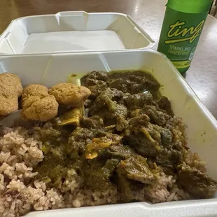 Curry goat with rice &amp; peas, and festival.