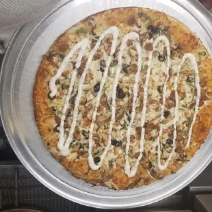 a person holding a pizza