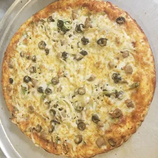 a pizza with cheese and olives