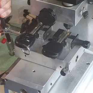 Milling a new copy of a Lexus High Security Key on a machine made specifically for this type of key. Sometimes know as  Laser cut.