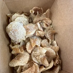 Homemade potato chips with garlic butter seasoninh
