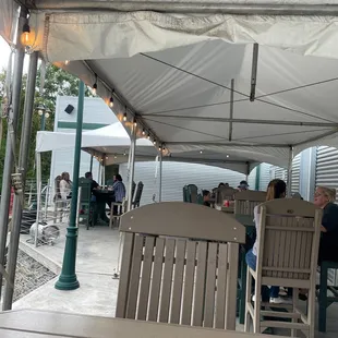 Covered patio ( upper level)  Hi top tables all around.