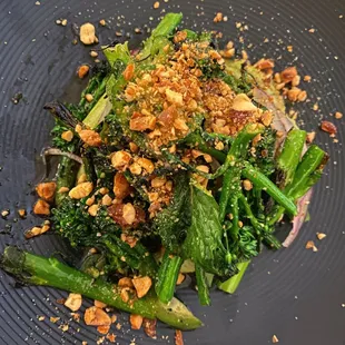 a plate of broccoli and other vegetables