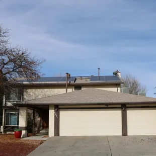 a house with a solar panel on the roof