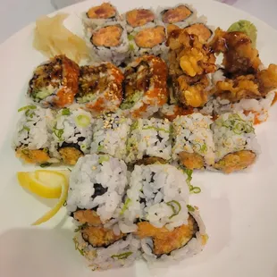 I variety of maki rolls including spicy salmon, tuna and soft shell crab