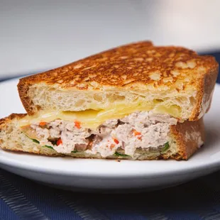 Tuna Melt - Yellowfin Tuna, Vermont Cheddar, Olives, Celery,
Onion, &amp; Dijonnaise on a Rustic Loaf. Available for lunch