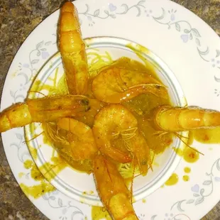Barbecue Shrimp topped over Angel Hair Pasta