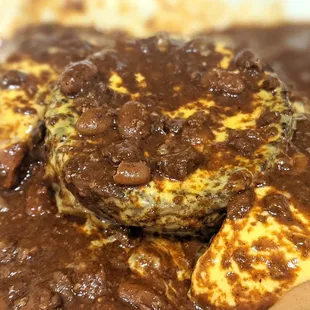 Chili Cheese burger comes like this, chili poured onto buns and patty.