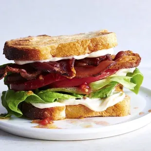a bacon, lettuce, and tomato sandwich