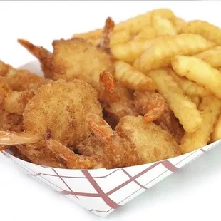 a basket of fried shrimp and fries