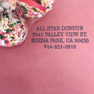 Sprinkle Donut Holes in the bag. The pink box is if you order a lot of donuts they put it in a cute pink box with their address on it.