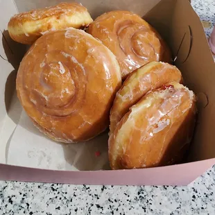 Cinnamon bun donuts and jelly filled donuts