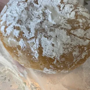 Powdered donut with raspberry filling