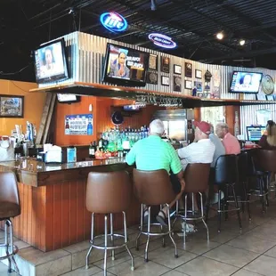 people sitting at the bar